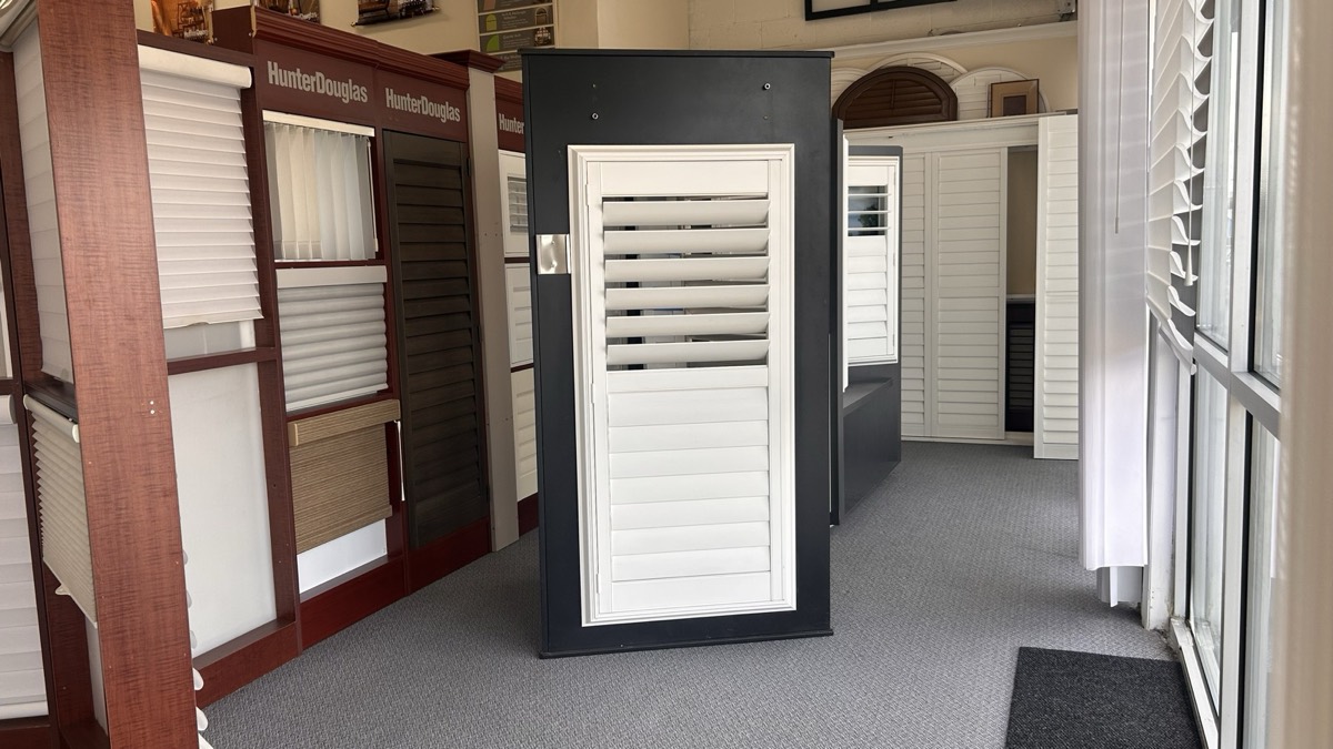 Full-size shutter and blind displays by the showroom windows
